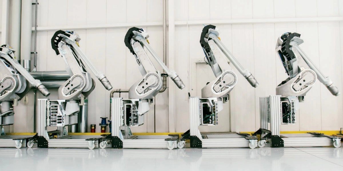 Line of Robotics Machines on a Clean Factory Floor